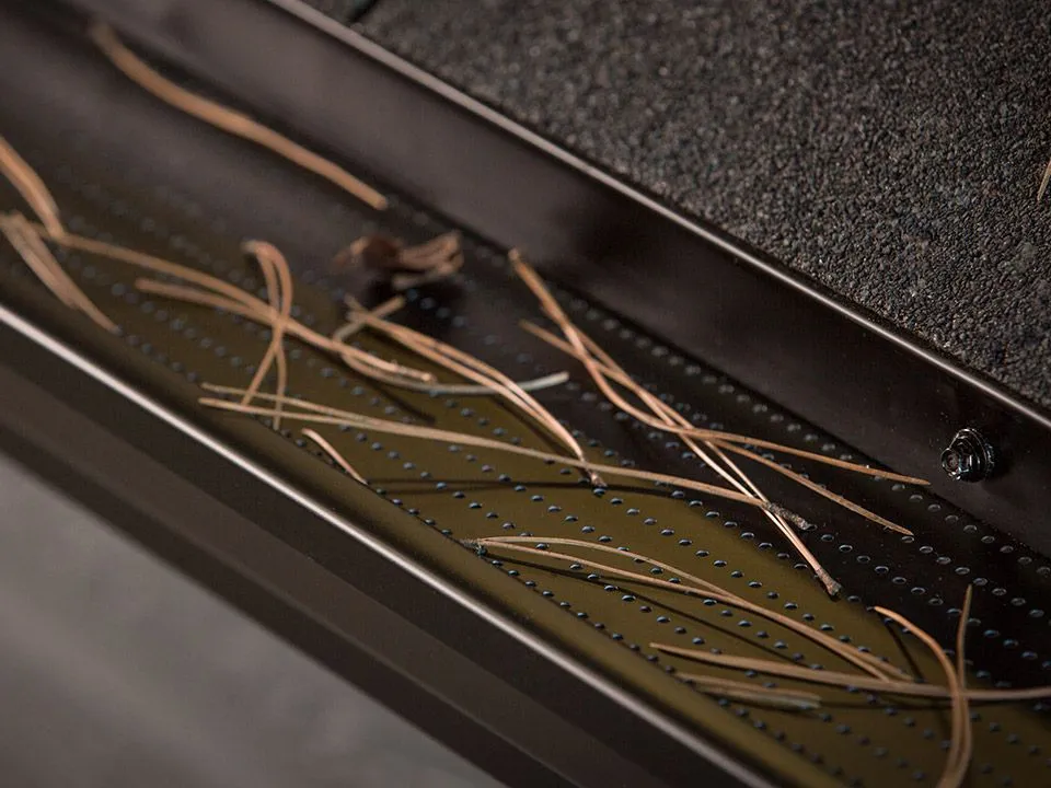 DoublePro® holding back pine needles — Hybreed Gutters, Castlegar BC